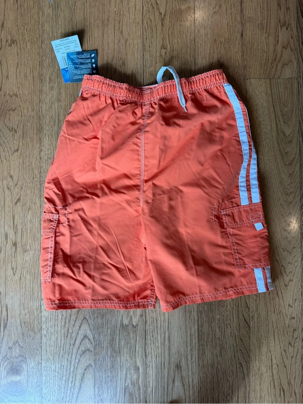 Kanu Surf Men's Coral-Orange Swim Trunks with White Drawstring